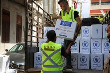 Workers unload WFP food aid at the Karageusian Center in Beirut, Lebanon - WFP/ Ziad_Rizkallah